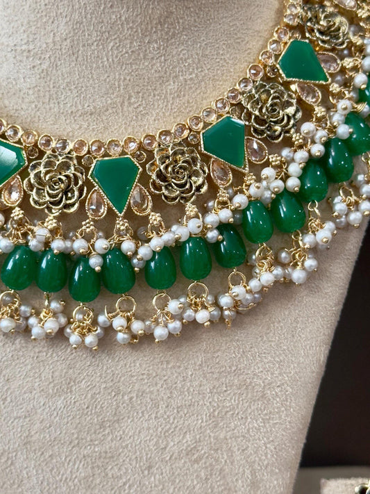 Bollywood Ethnic kundun set with emerald green stones