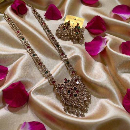 Bollywood India kundan and pearl mala with earrings.