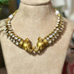 Bollywood ethnic Indian gold finish set with stones.