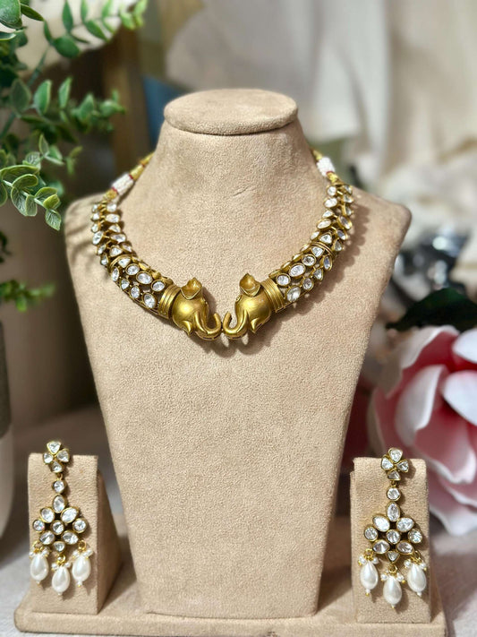 Bollywood ethnic Indian gold finish set with stones.