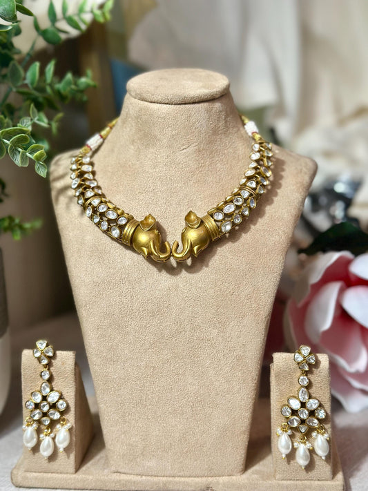 Bollywood ethnic Indian gold finish set with stones.