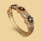 Luxury Gold Tone Bangle CZ Stone Sapphire Color Floral Design