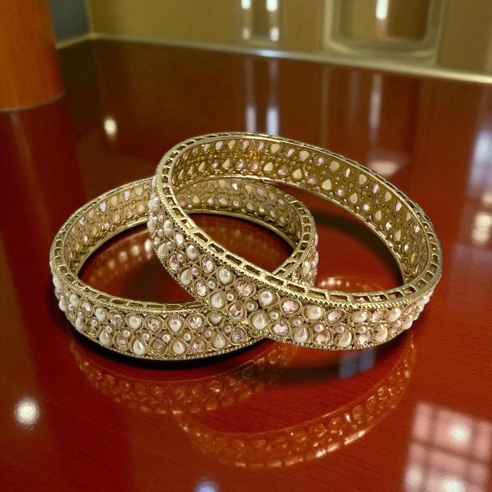 Elegant Gold Kundan Bangles with Pearl Stones - Traditional Indian Jewelry for Women
