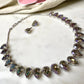 beautifully crafted Sworaski crystals necklace set with studs/wedding /silver plated/rhodium finish adjustable.