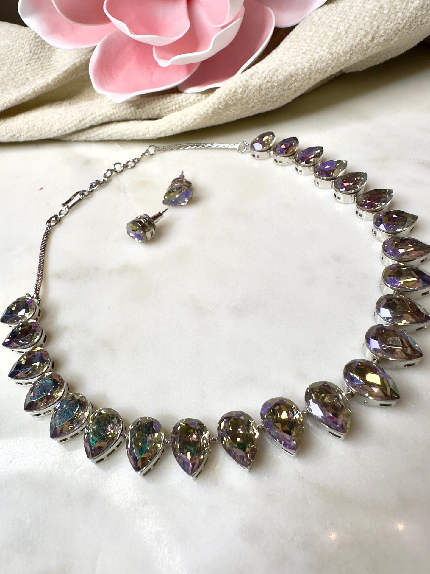 beautifully crafted Sworaski crystals necklace set with studs/wedding /silver plated/rhodium finish adjustable.