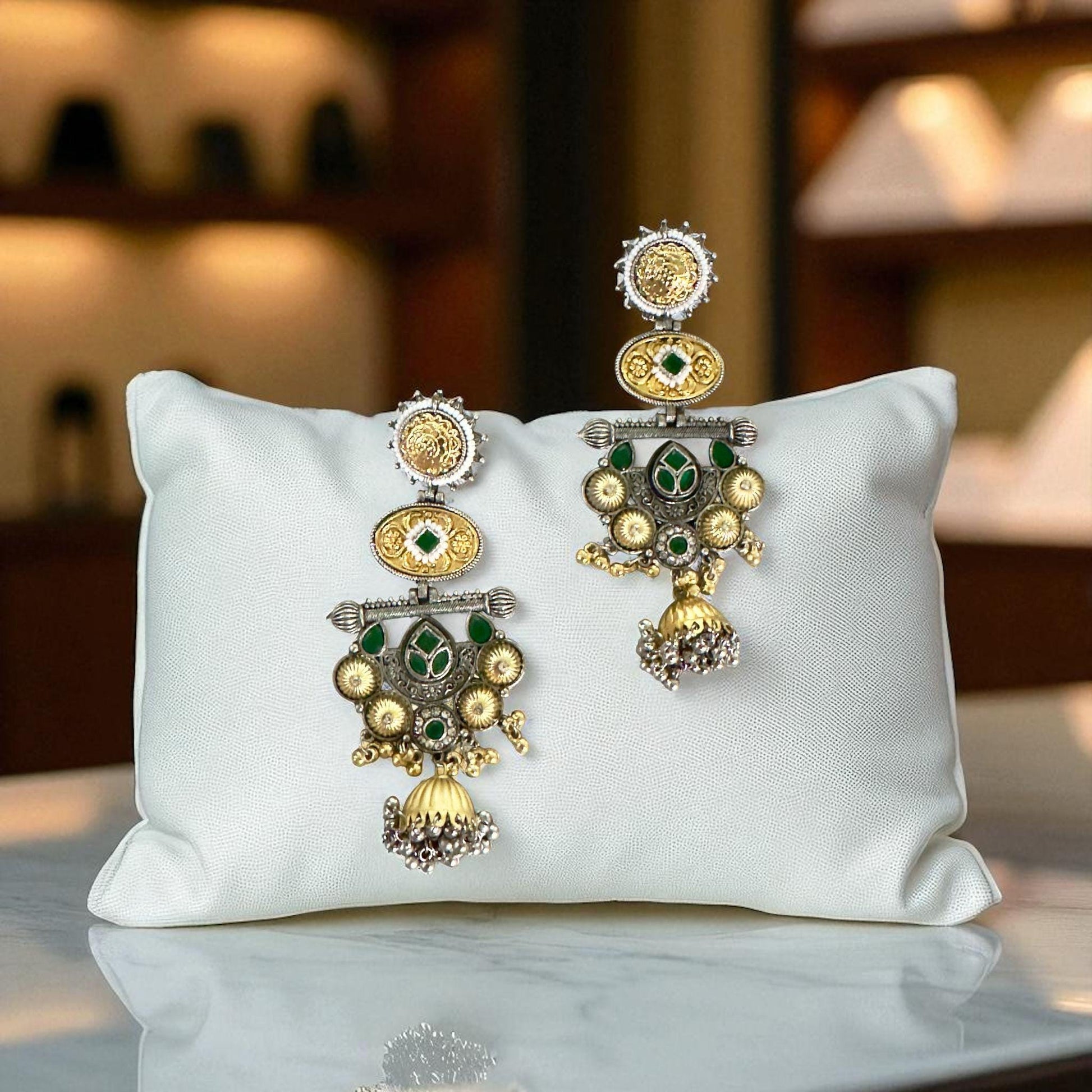 Bollywood Style Traditional Dual-Tone Earrings with Green Stones & Jhumka Design