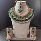 Bollywood Ethnic kundun set with emerald green stones