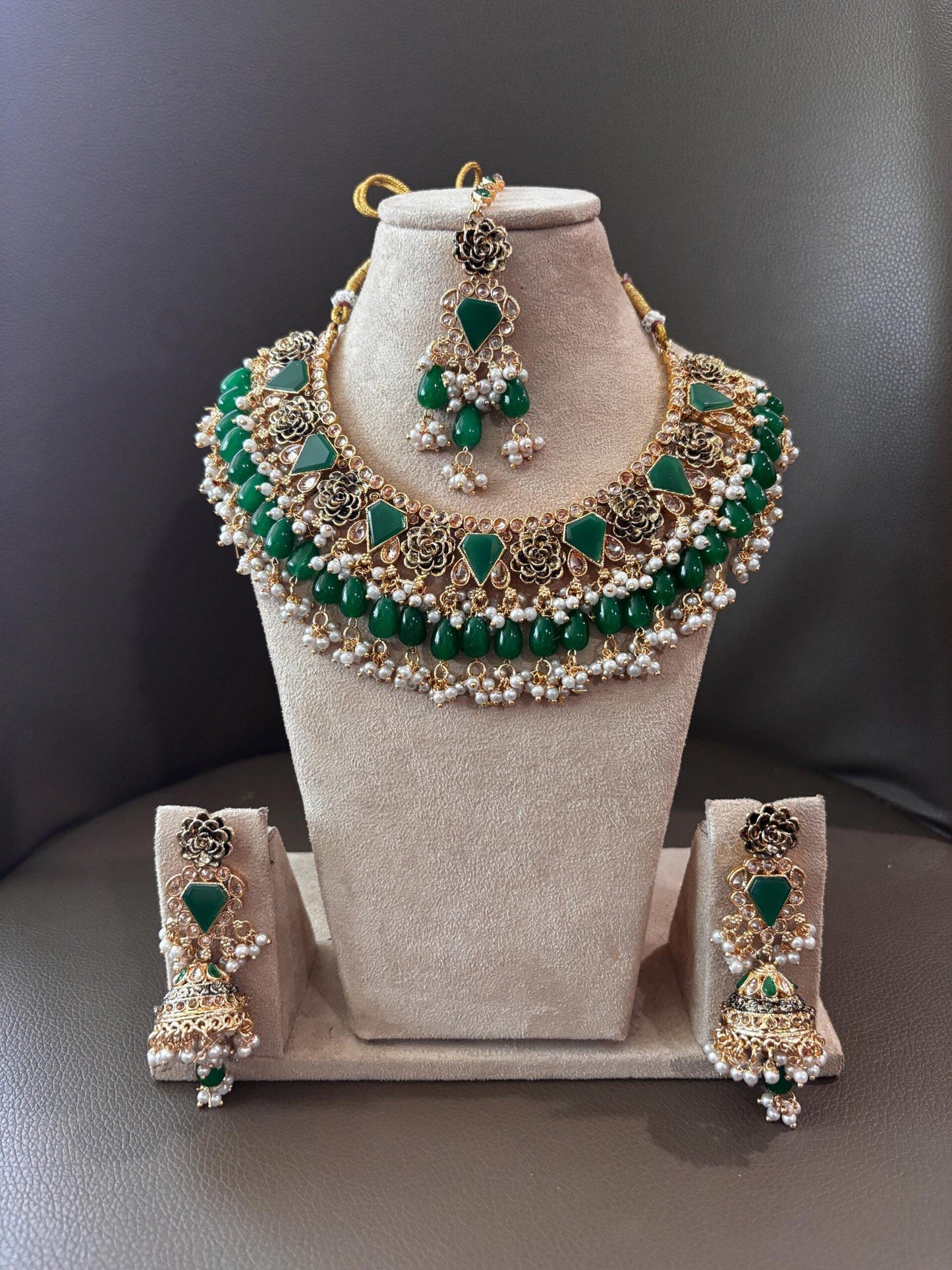 Bollywood Ethnic kundun set with emerald green stones