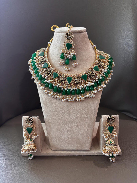 Bollywood Ethnic kundun set with emerald green stones