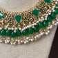 Bollywood Ethnic kundun set with emerald green stones