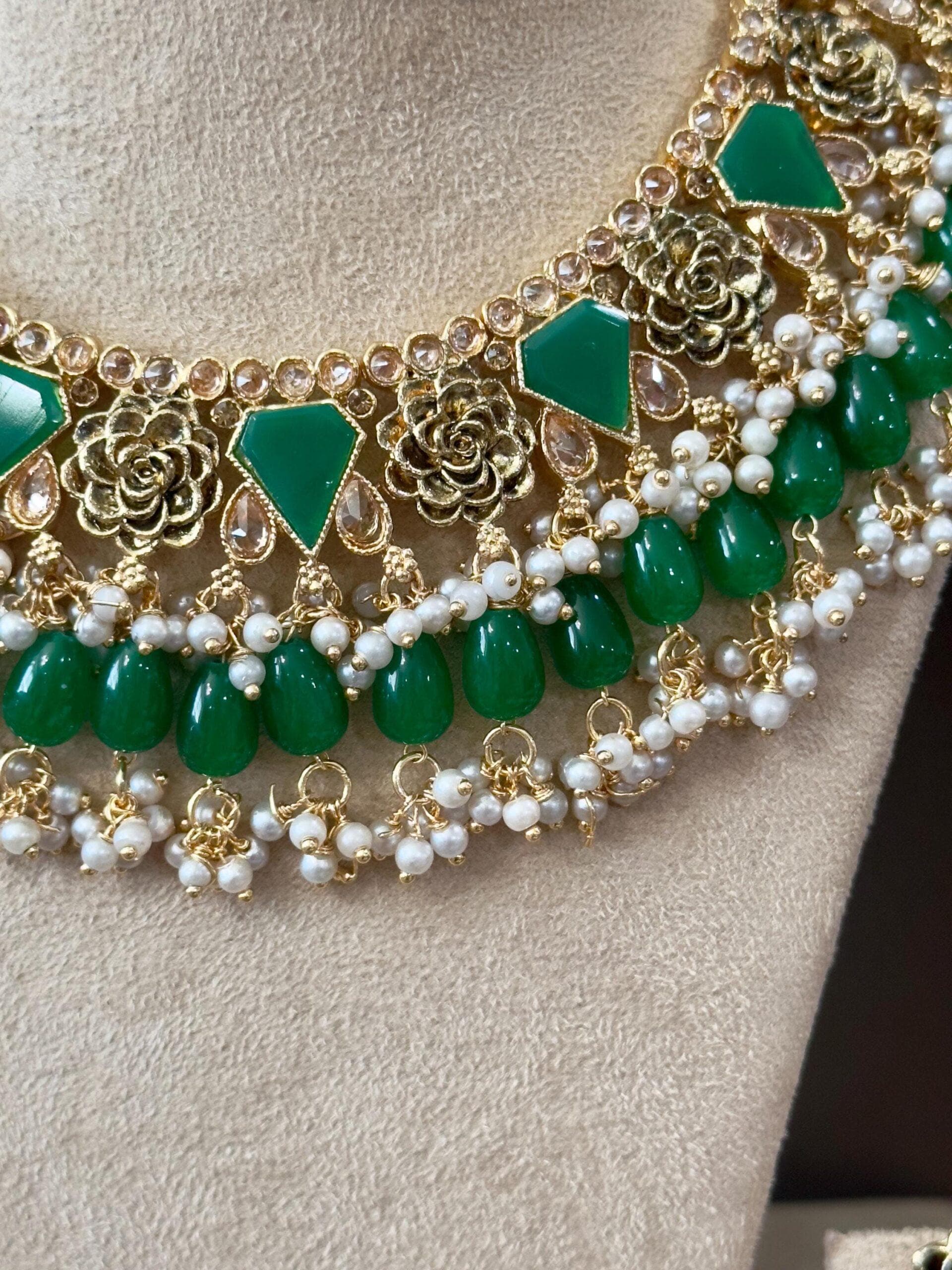 Bollywood Ethnic kundun set with emerald green stones