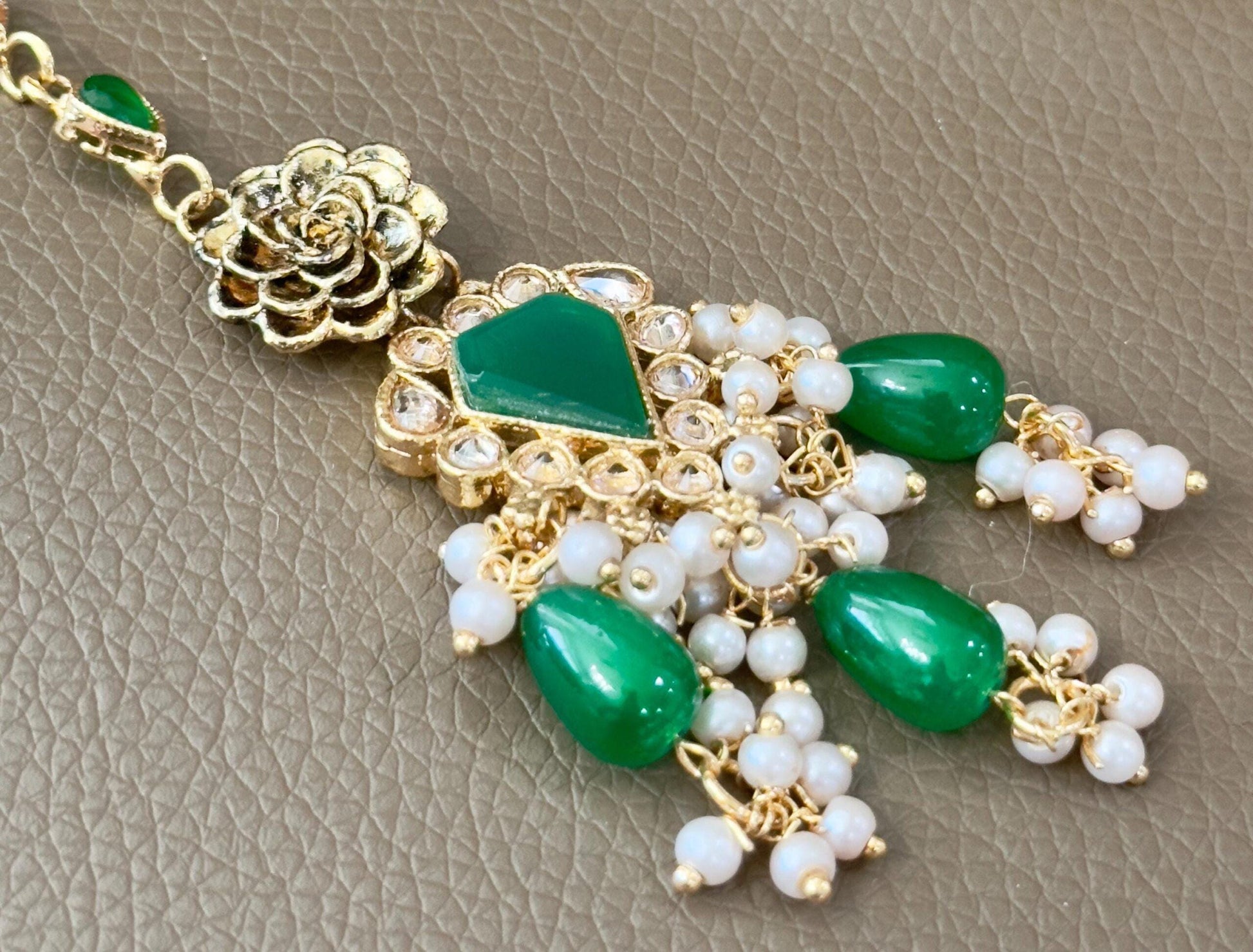Bollywood Ethnic kundun set with emerald green stones
