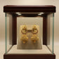 Traditional Gold-Tone Jhumka Earrings with Red & Green Ad Stones
