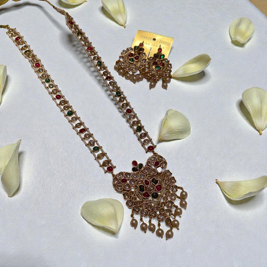 Bollywood India kundan and pearl mala with earrings.