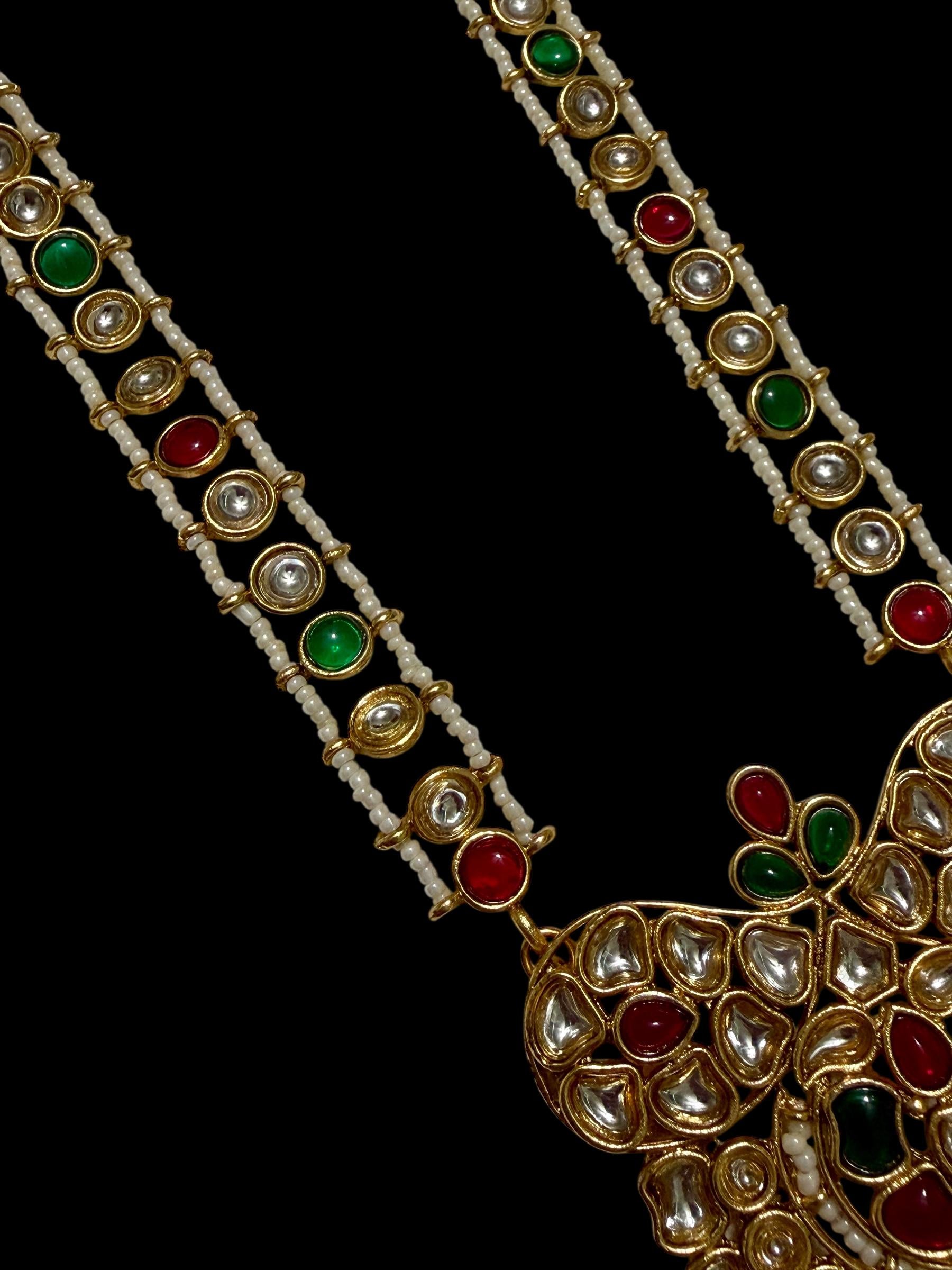 Bollywood India kundan and pearl mala with earrings.