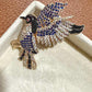 Rhinestone Bird Brooch: Gold Crystal Statement Pin – Elegant Nature Inspired Jewelry