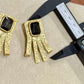 Textured Gold Geometric Earrings with Black Stone Statement Dangle Design