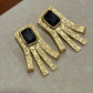 Textured Gold Geometric Earrings with Black Stone Statement Dangle Design