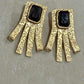 Textured Gold Geometric Earrings with Black Stone Statement Dangle Design