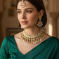 Bollywood Ethnic kundun set with emerald green stones