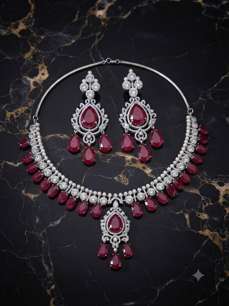 Elegant Highend designer Silver Tone Jewelry Set with Ruby Red Stones for Receptions and Occasions Statement piece
