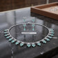 Elegant Leaf Motif Necklace Set with Simulated Emerald Stones