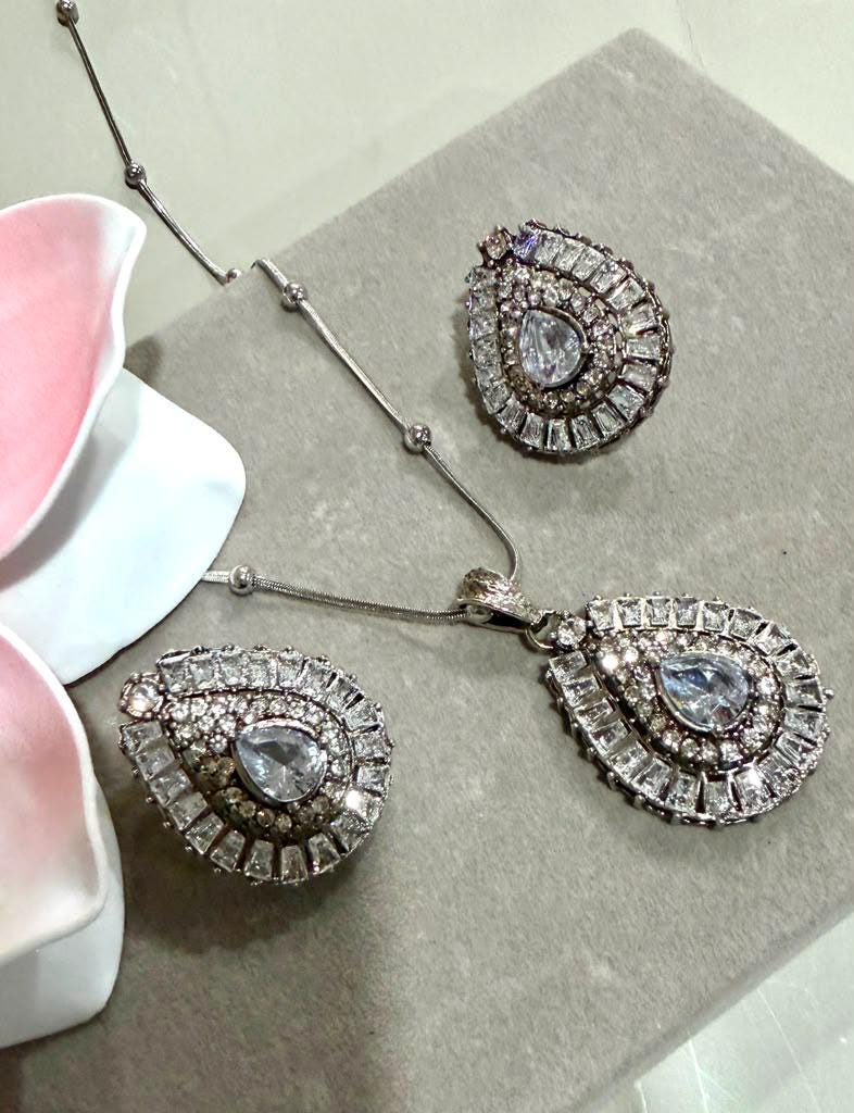 Rhodium Finish Teardrop Pendant Necklace Set with CZ Stones and Matching Statement Stud Earrings