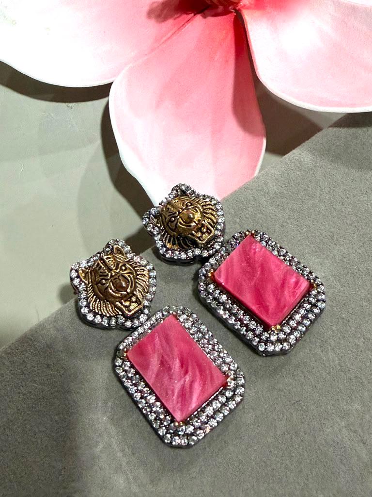 Rhodium Finish Earrings with Blush Pink Geometric Panels, CZ Border and Lion Stud Design