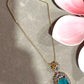 Gold Plated Statement Necklace with Aqua Blue Oval Pendant, CZ Detailing