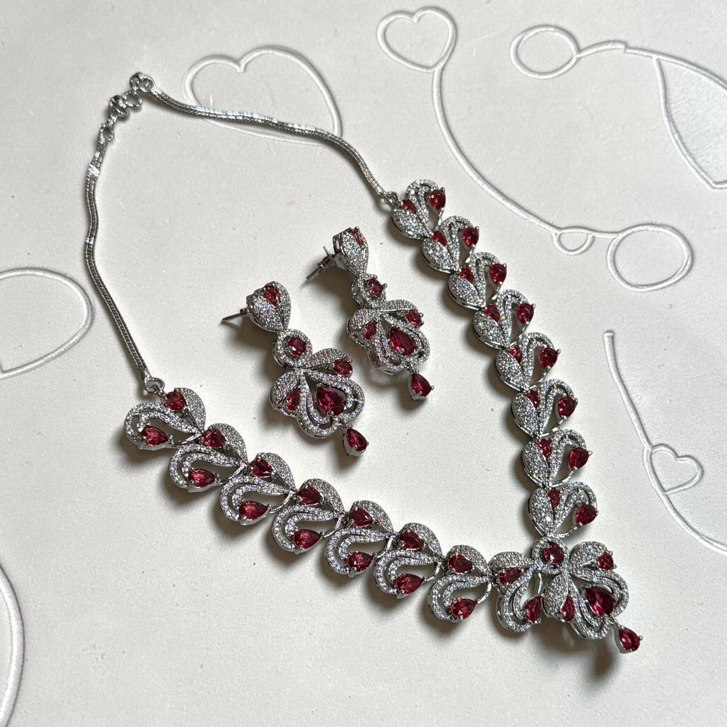 Designer Ruby Pink Necklace Set Featuring Floral Inspired CZ Pattern, Matching Earrings