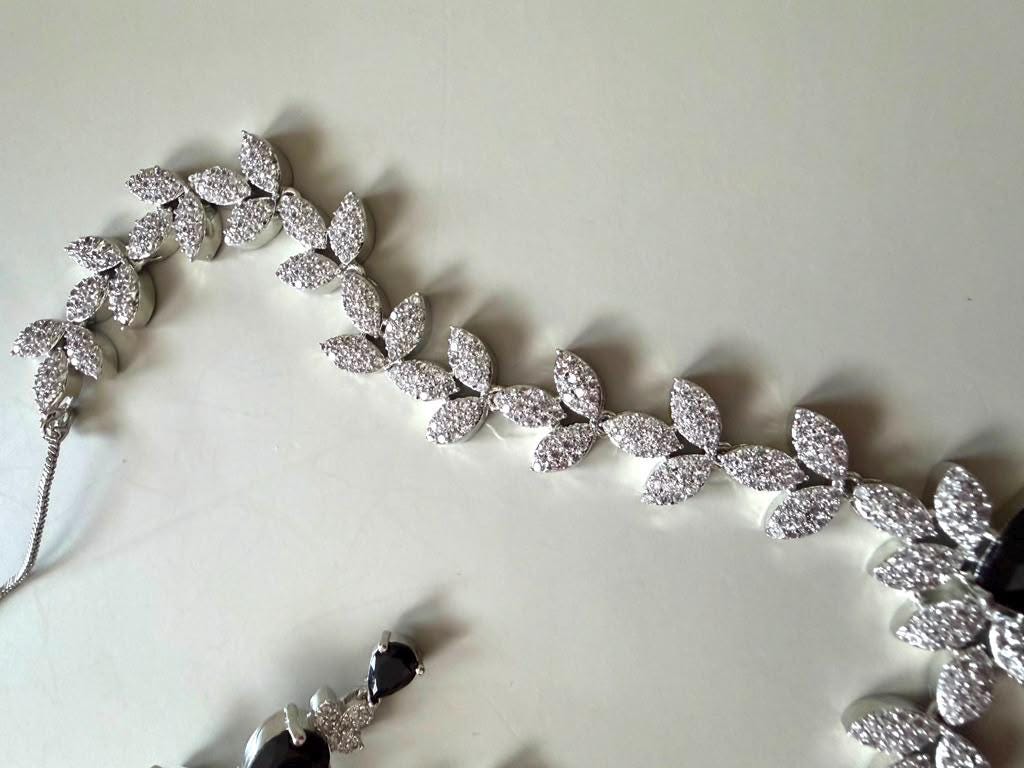Modern Luxury Leaf Necklace with Coordinated Drop Earrings black onyx color
