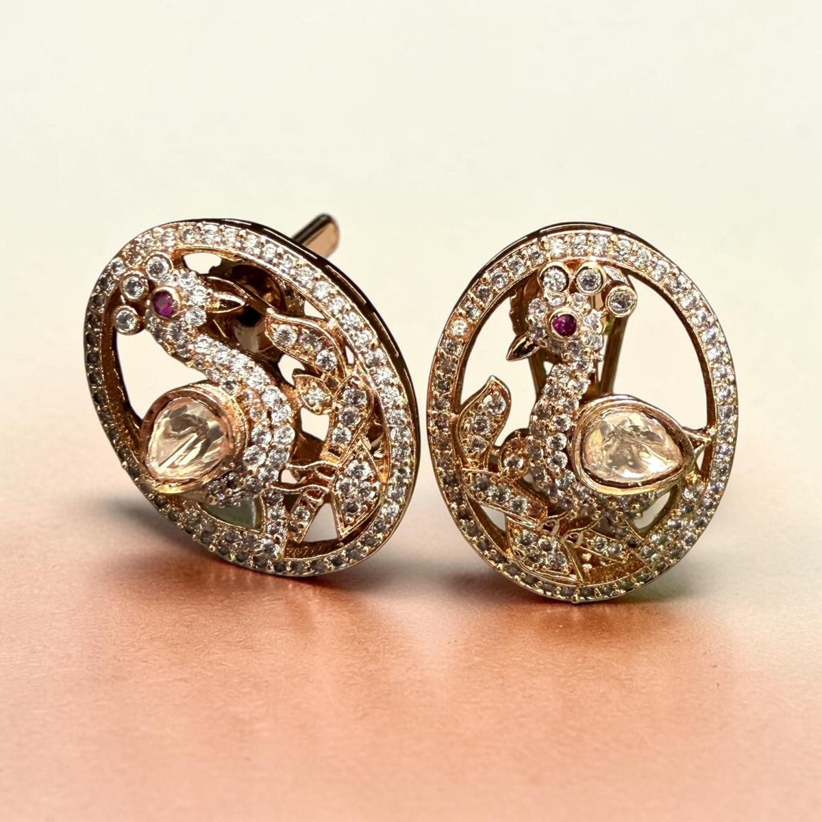 Peacock Earrings with Ruby Stone Accents and Sparkling Details in an Elegant Statement Design