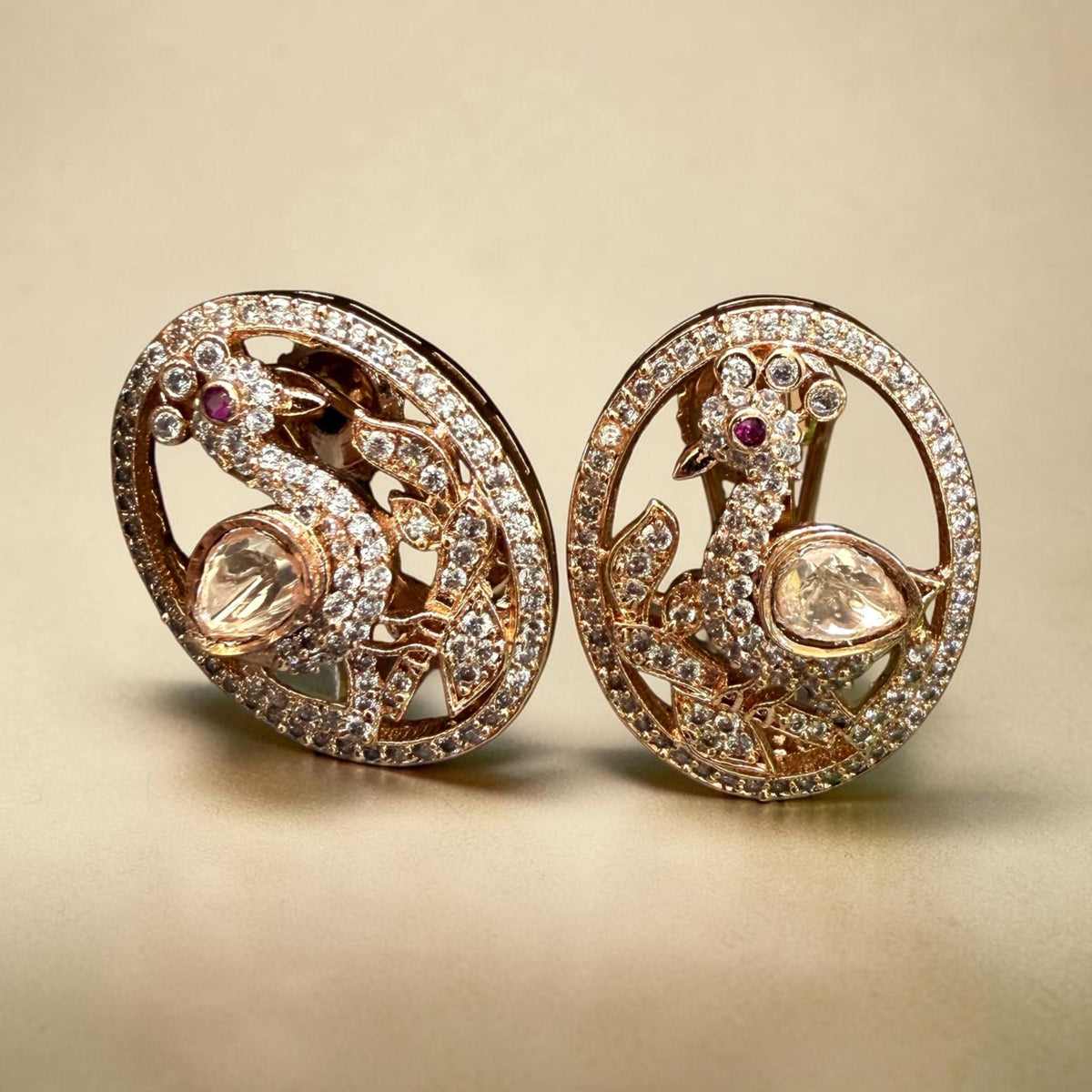 Peacock Earrings with Ruby Stone Accents and Sparkling Details in an Elegant Statement Design