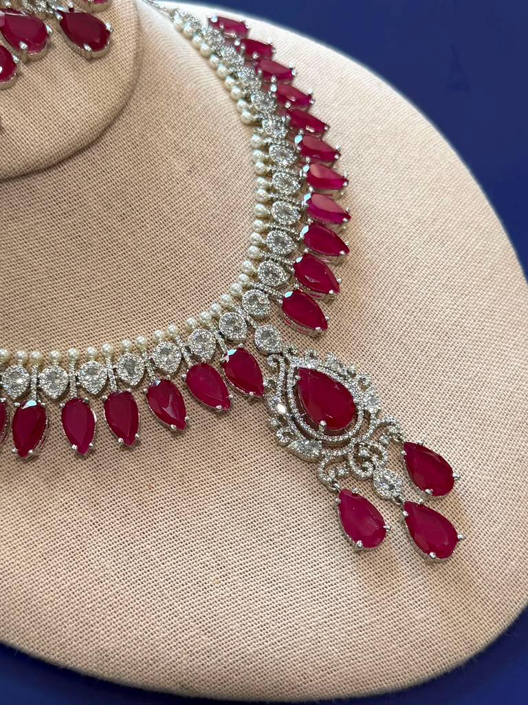 Elegant Highend designer Silver Tone Jewelry Set with Ruby Red Stones for Receptions and Occasions Statement piece