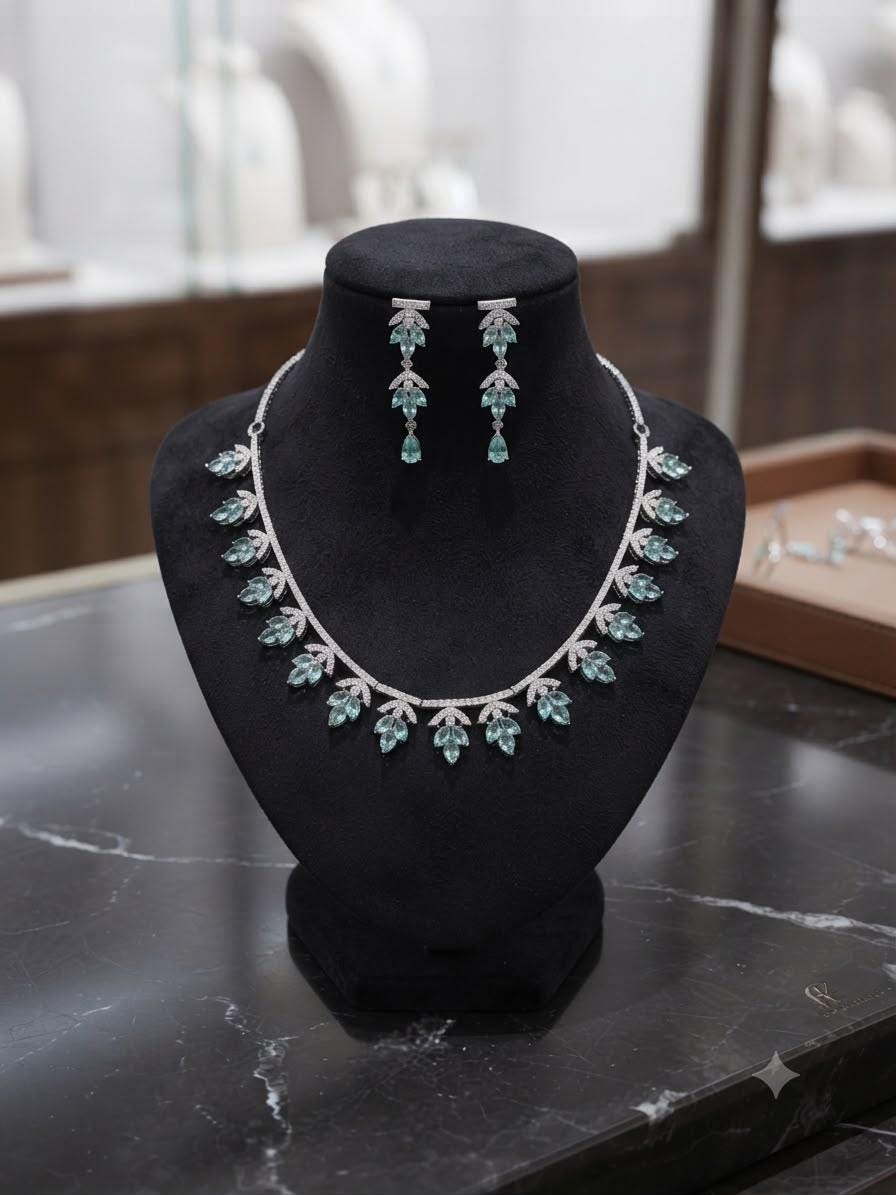 Elegant Leaf Motif Necklace Set with Simulated Emerald Stones