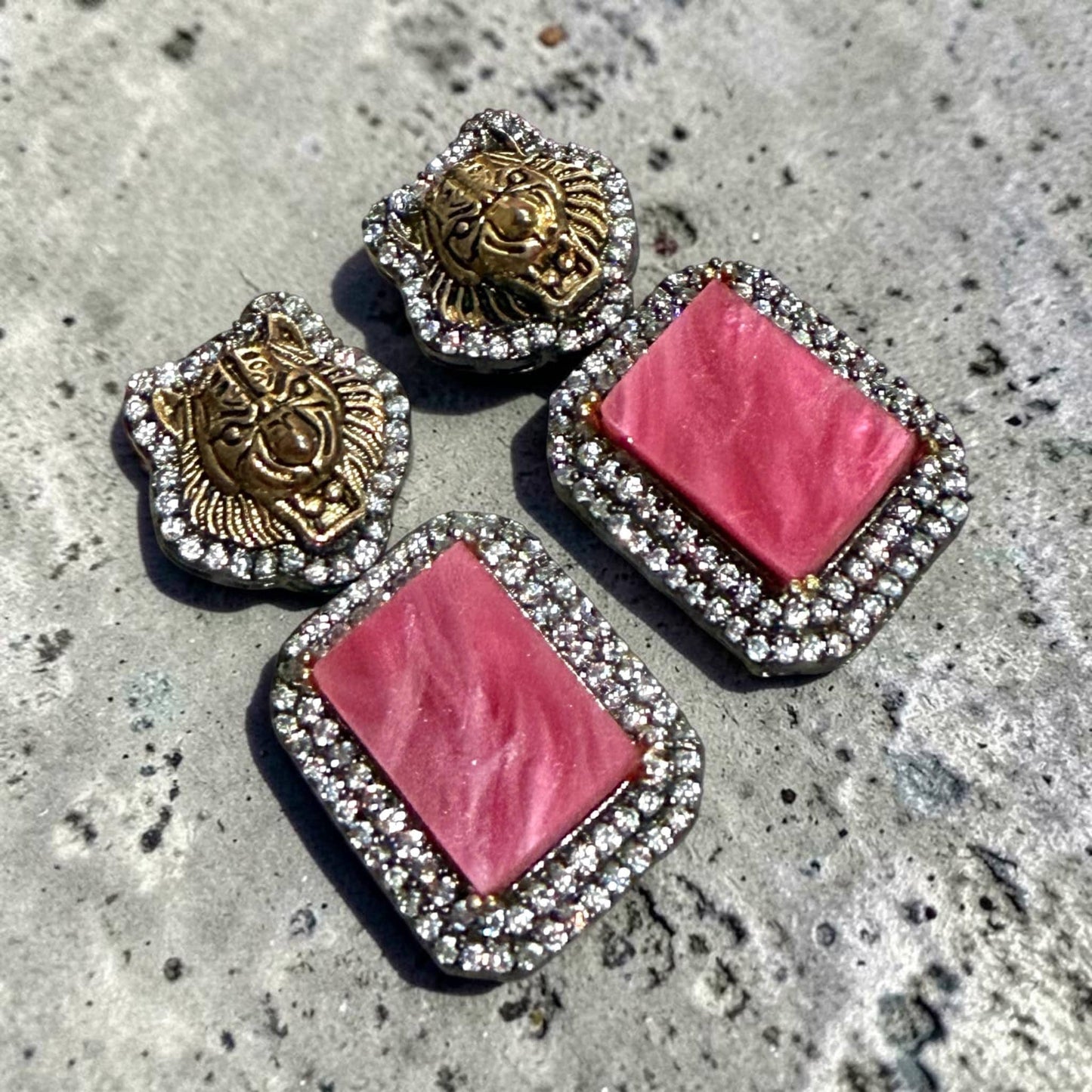Rhodium Finish Earrings with Blush Pink Geometric Panels, CZ Border and Lion Stud Design