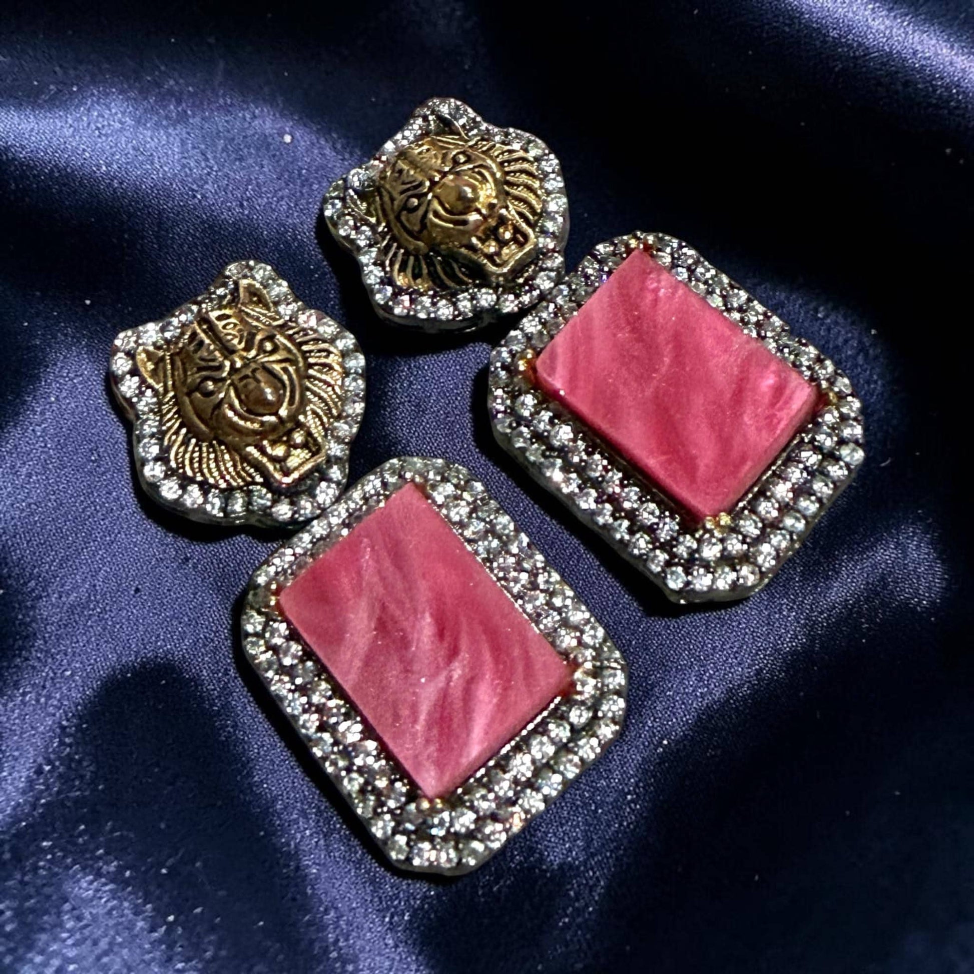 Rhodium Finish Earrings with Blush Pink Geometric Panels, CZ Border and Lion Stud Design