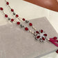 Bohemian Tassel Pendant Necklace with Ruby Pink Beads, Floral Motif and Sparkling Rhodium Finish