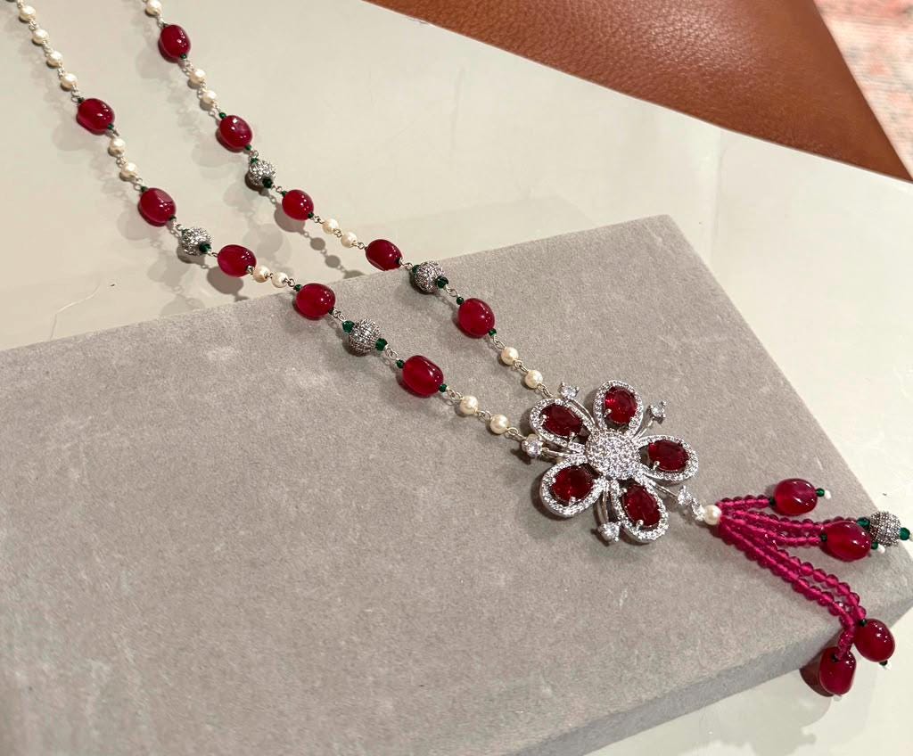 Bohemian Tassel Pendant Necklace with Ruby Pink Beads, Floral Motif and Sparkling Rhodium Finish