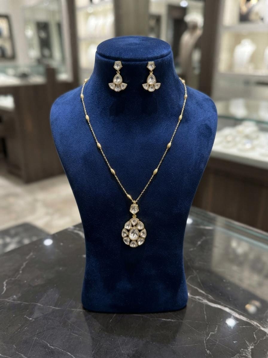 Designer Gold Finish Pendant Necklace Set Featuring Monzonite Stones, Elegant Floral Inspired Jewelry