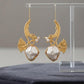 Gold Tone Finish Botanical Earrings with barouk pearl Sculptural Leaf Design and Modern Style
