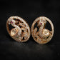 Peacock Earrings with Ruby Stone Accents and Sparkling Details in an Elegant Statement Design
