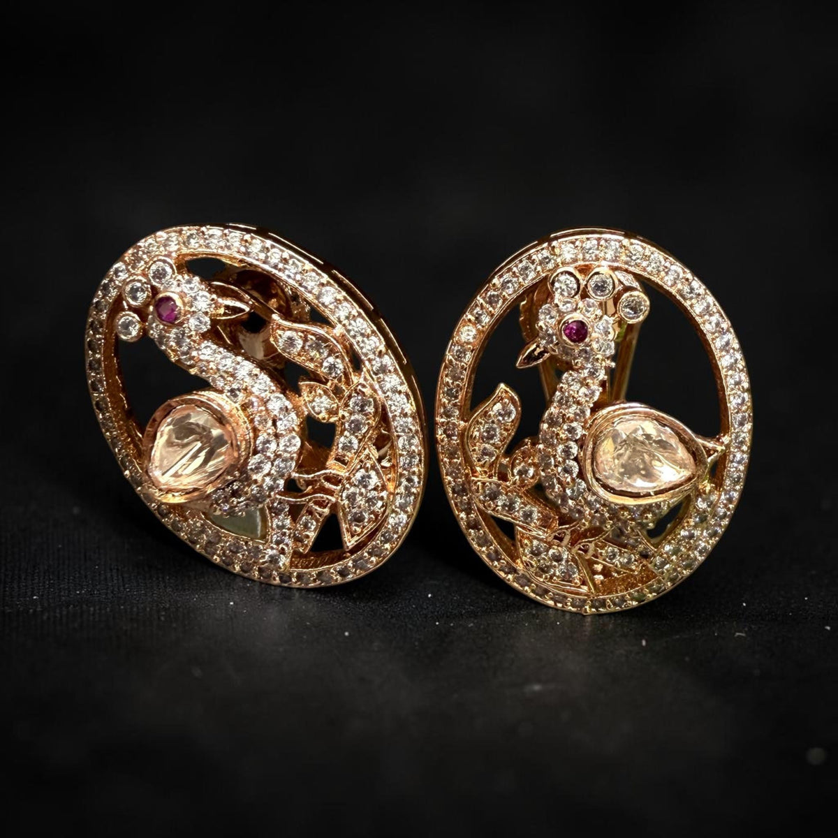Peacock Earrings with Ruby Stone Accents and Sparkling Details in an Elegant Statement Design