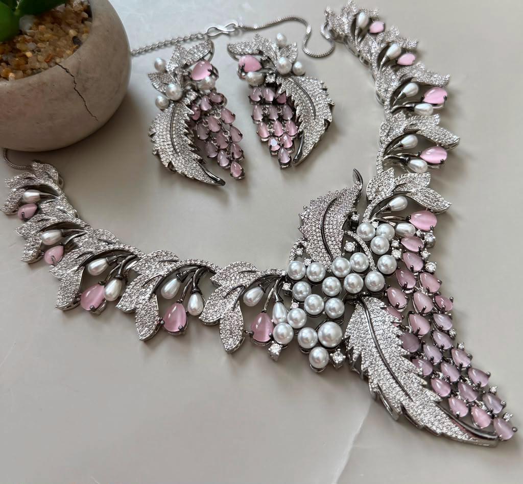 Blush Pink Statement Necklace with Leaf Inspired Details and Accompanying Earrings