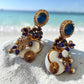 Ornate Blue Stone Drop Earrings with Iridescent AD Stones and Floral Gold Finish Design