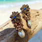 Sapphire Blue Floral Drop Earrings with AD Stones and Gold Tone Finish Statement