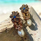 Sapphire Blue Floral Drop Earrings with AD Stones and Gold Tone Finish Statement