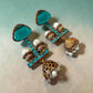 Statement designer Jhumka Earrings Featuring Turquoise Glass Stones Pearl Accents and Gold Finish Craftsmanship