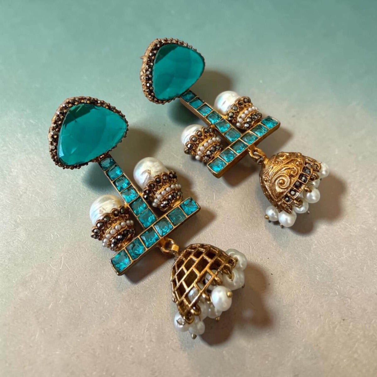 Statement designer Jhumka Earrings Featuring Turquoise Glass Stones Pearl Accents and Gold Finish Craftsmanship