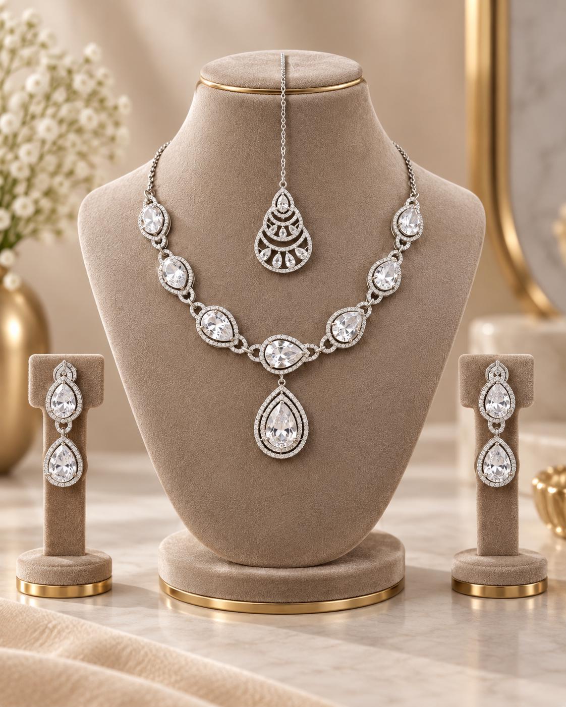 Mesmerizing Cubic Zirconia Jewelry Ensemble with Rhodium Finish and Elegant Drop Earrings